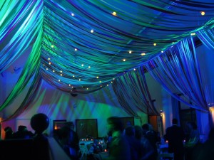 colourful-ribbon-canopy-wedding-reception-town-village-hall-celebration-beautiful-oculux-lighting-late-evening