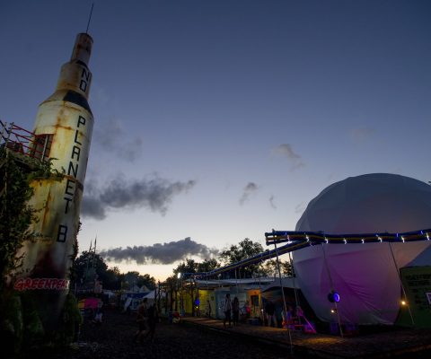 Rocket Saturn V on the Greenpeace field